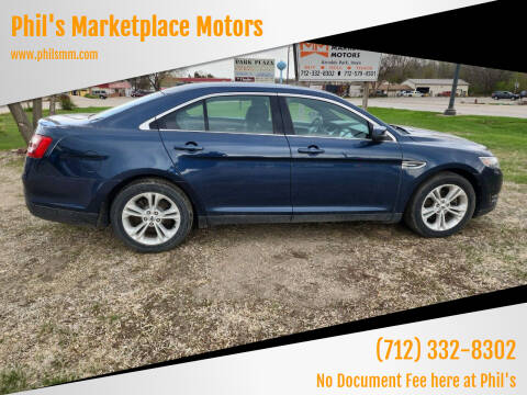 2017 Ford Taurus for sale at Phil's Marketplace Motors in Arnolds Park IA