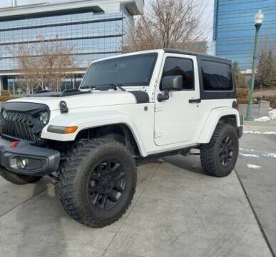 2013 Jeep Wrangler for sale at Classic Car Deals in Cadillac MI