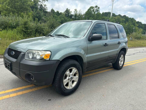 2005 Ford Escape for sale at Jim's Hometown Auto Sales LLC in Cambridge OH