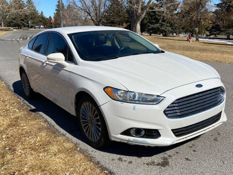 2014 Ford Fusion for sale at BELOW BOOK AUTO SALES in Idaho Falls ID