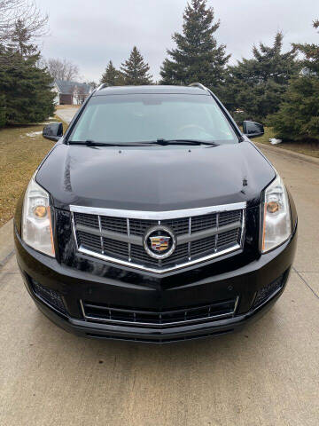 2010 Cadillac SRX for sale at Roman's Auto Sales in Warren MI