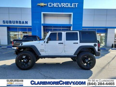 2013 Jeep Wrangler Unlimited for sale at Suburban Chevrolet in Claremore OK