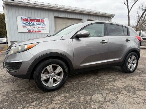 2012 Kia Sportage for sale at HOLLINGSHEAD MOTOR SALES in Cambridge OH