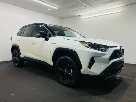 2019 Toyota RAV4 Hybrid for sale at Champagne Motor Car Company in Willimantic CT