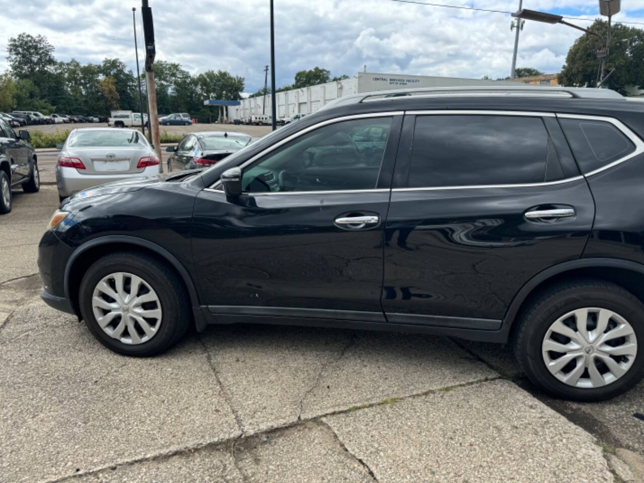 2015 Nissan Rogue for sale at First Class Auto Mall in Akron, OH