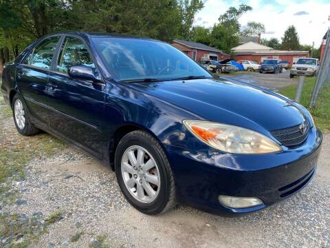 2003 Toyota Camry for sale at Godwin Motors in Silver Spring MD