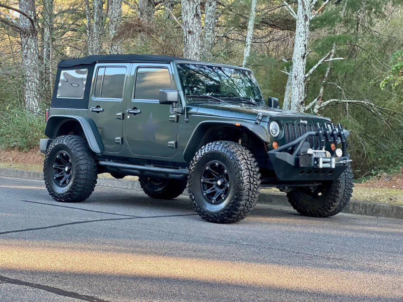 2011 Jeep Wrangler Unlimited for sale at H and S Auto Group in Canton GA