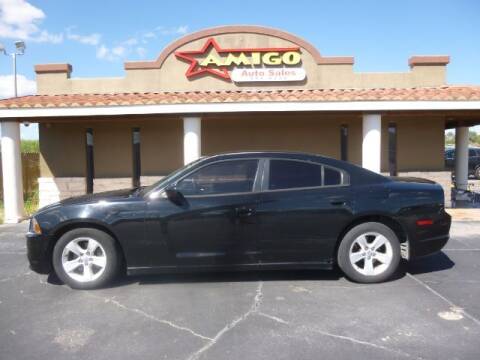 2014 Dodge Charger for sale at AMIGO AUTO SALES in Kingsville TX