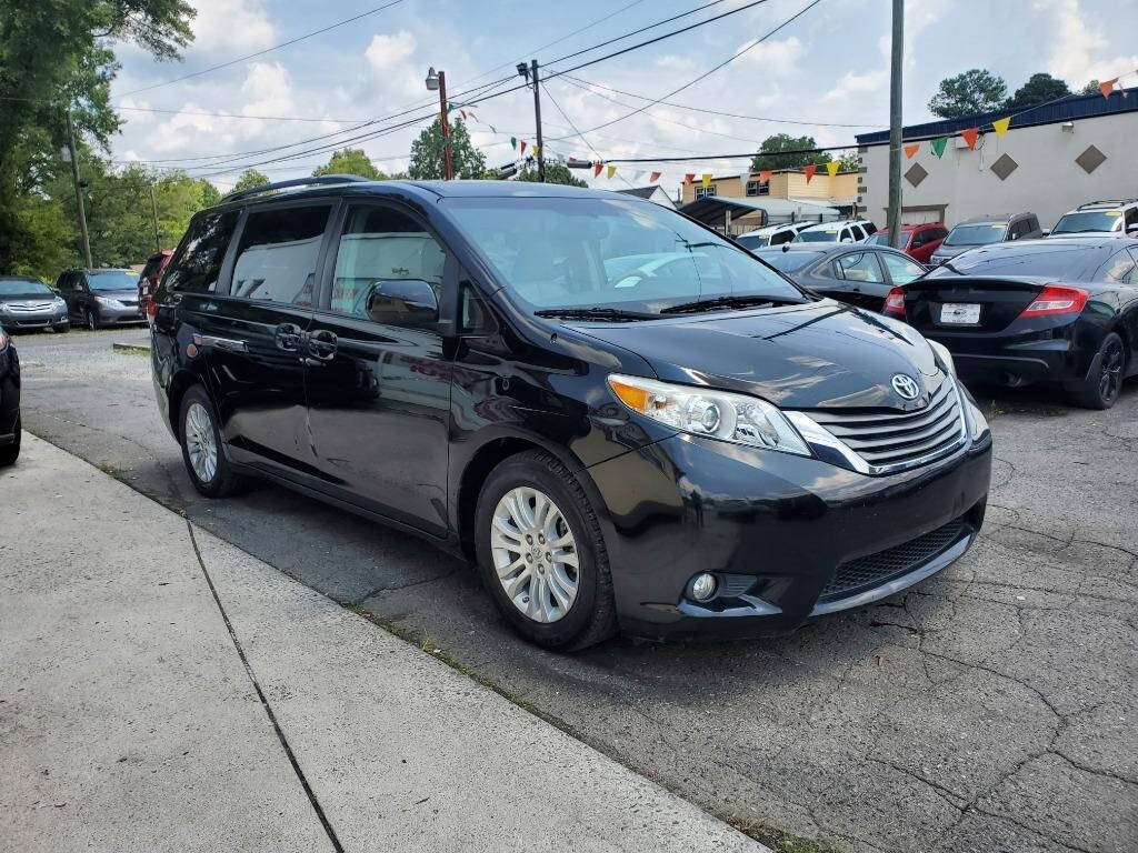 2013 Toyota Sienna for sale at DAGO'S AUTO SALES LLC in Dalton, GA