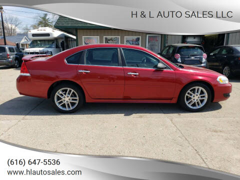 2013 Chevrolet Impala for sale at H & L AUTO SALES LLC in Wyoming MI