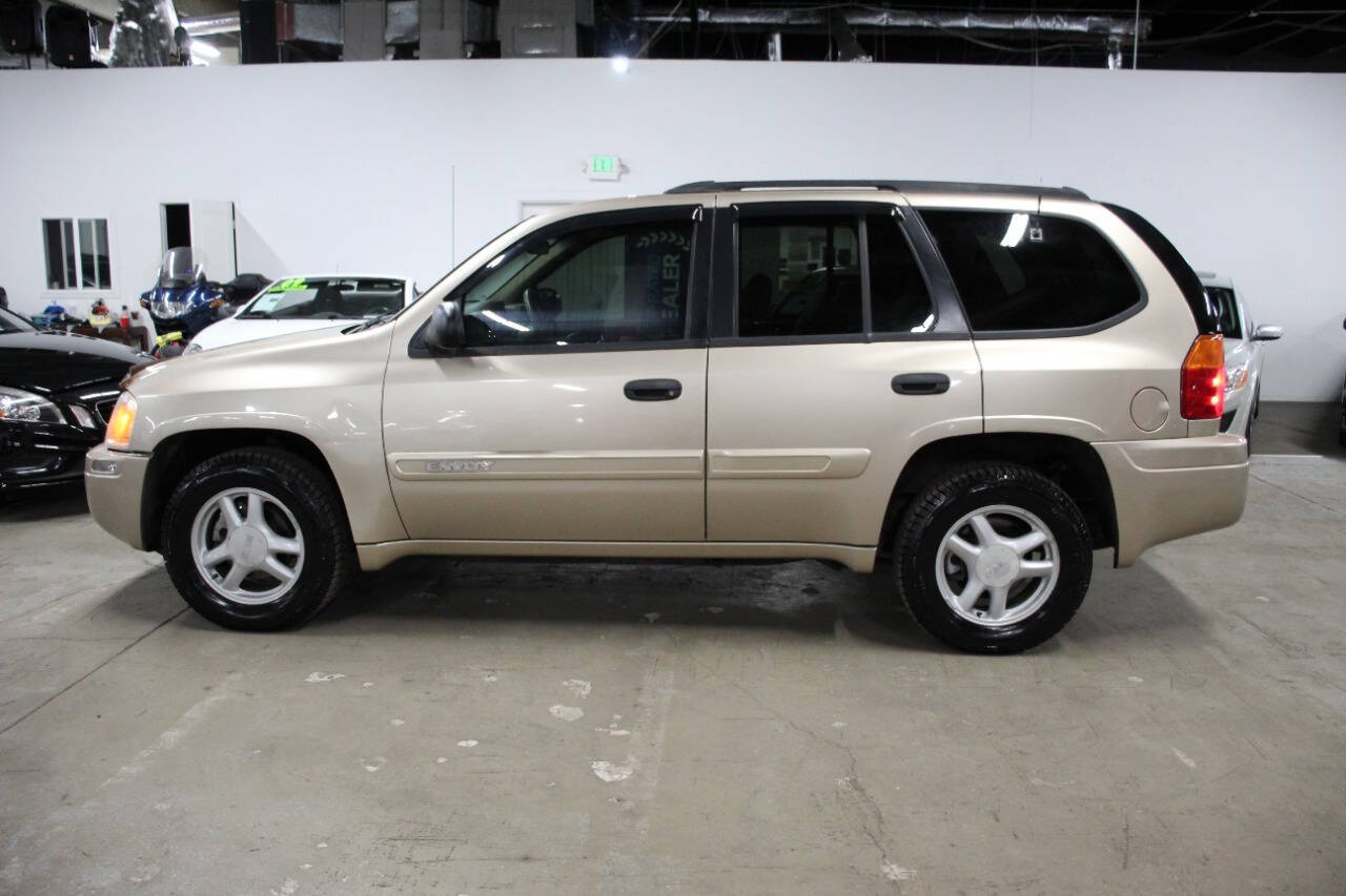 Gold 2004 GMC Envoy SLT SLT 4WD 4dr SUV 2