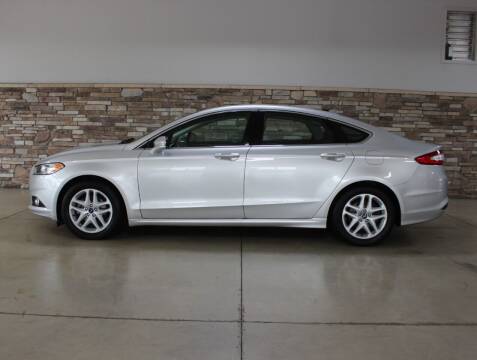 2014 Ford Fusion for sale at Bud & Doug Walters Auto Sales in Kalamazoo MI