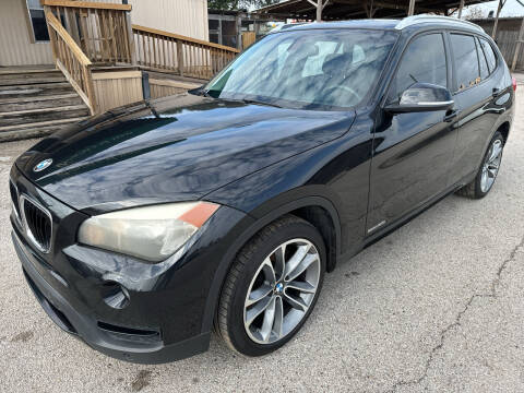 2014 BMW X1 for sale at OASIS PARK & SELL in Spring TX