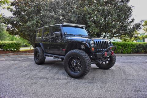 2012 Jeep Wrangler Unlimited for sale at Greystone Motors in Birmingham AL