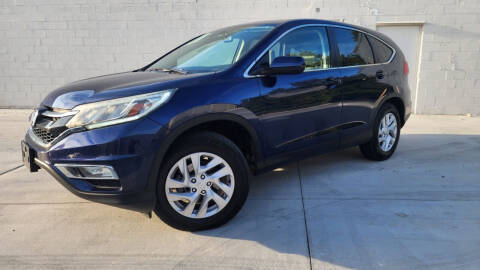 2015 Honda CR-V for sale at AUTO FIESTA in Norcross GA