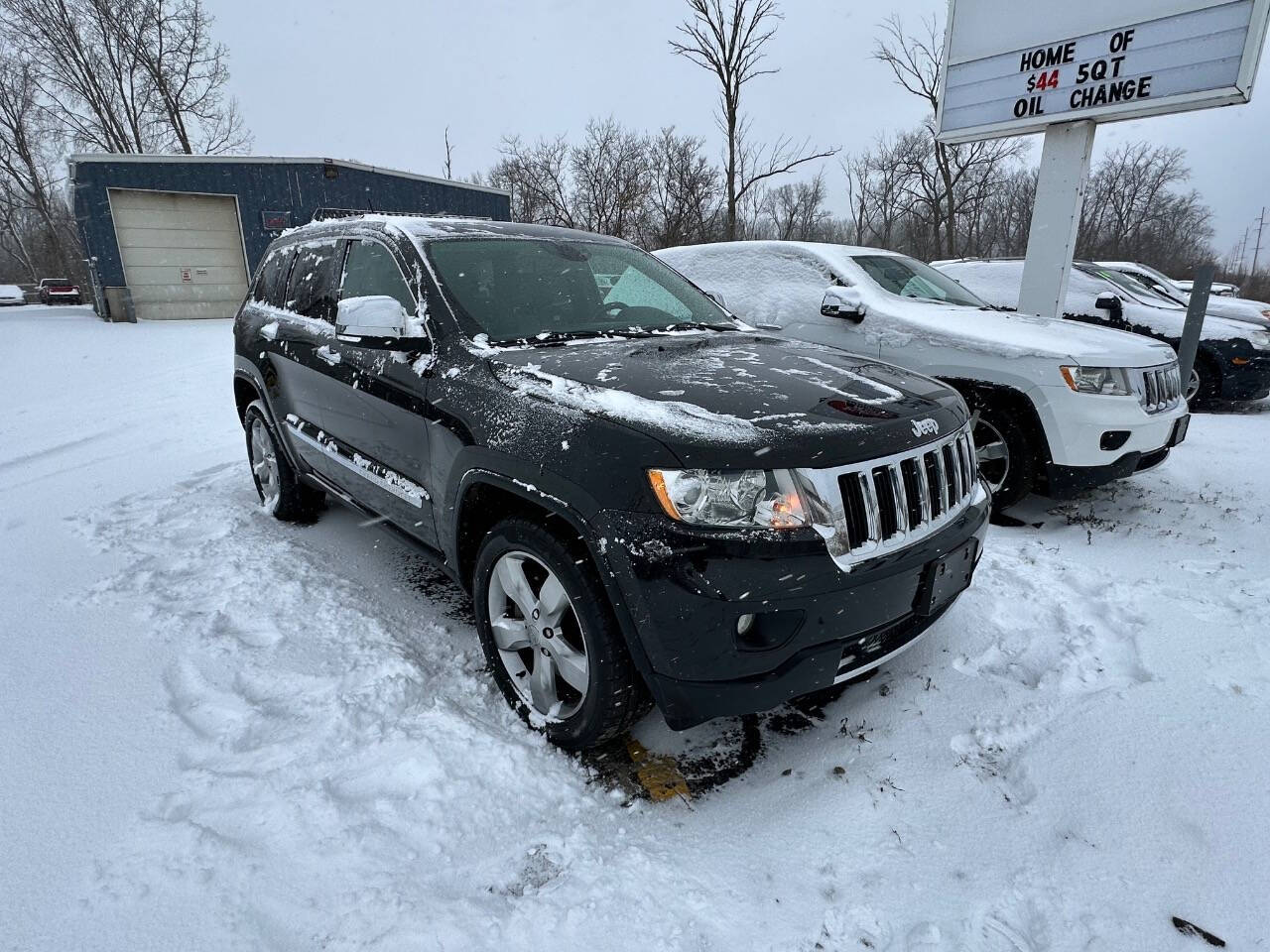 2013 Jeep Grand Cherokee for sale at Platinum Motors in Holland, MI