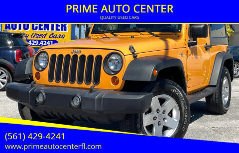 2012 Jeep Wrangler for sale at PRIME AUTO CENTER in Palm Springs FL
