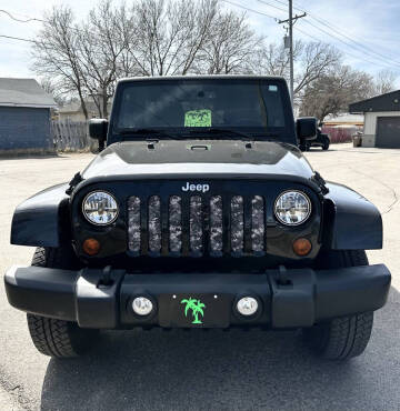 2013 Jeep Wrangler Unlimited for sale at Island Auto in Grand Island NE
