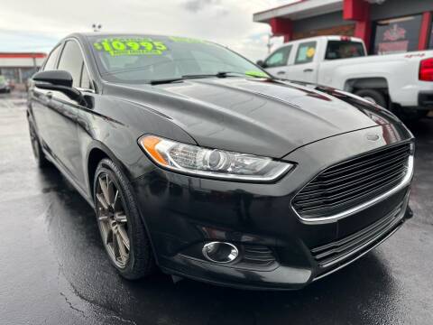 2014 Ford Fusion for sale at Premium Motors in Louisville KY