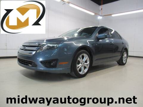 2012 Ford Fusion for sale at Midway Auto Group in Addison TX