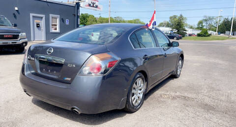 2011 Nissan Altima for sale at Castle Cars Inc. in Lansing MI