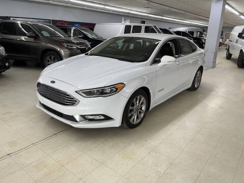 2017 Ford Fusion Hybrid for sale at AUTOTX CAR SALES inc. in North Randall OH