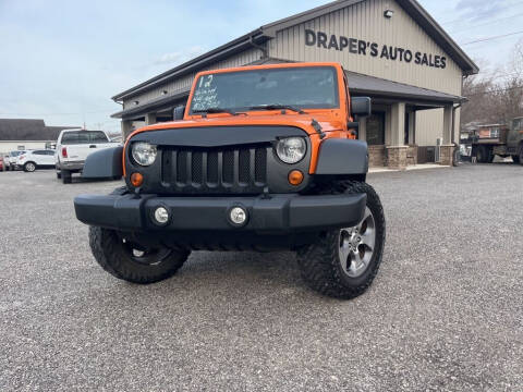 2012 Jeep Wrangler Unlimited for sale at Drapers Auto Sales in Peru IN