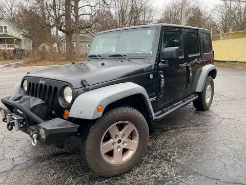 2011 Jeep Wrangler Unlimited for sale at Wheels Auto Sales in Bloomington IN