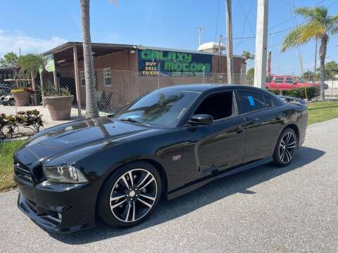 2013 Dodge Charger for sale at Galaxy Motors Inc in Melbourne FL