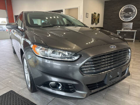 2015 Ford Fusion Hybrid for sale at Evolution Autos in Whiteland IN