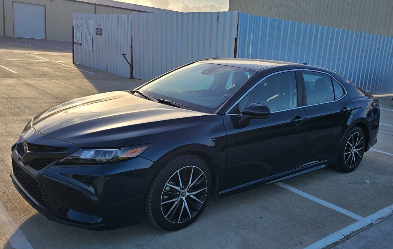 2021 Toyota Camry for sale at CAR MARKET AUTO GROUP in Sugar Land, TX