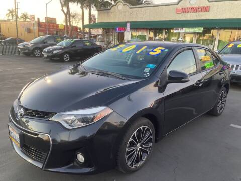 2015 Toyota Corolla for sale at La Mesa Auto Sales in Huntington Park CA