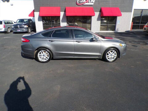 2014 Ford Fusion for sale at L A AUTOS in Omaha NE