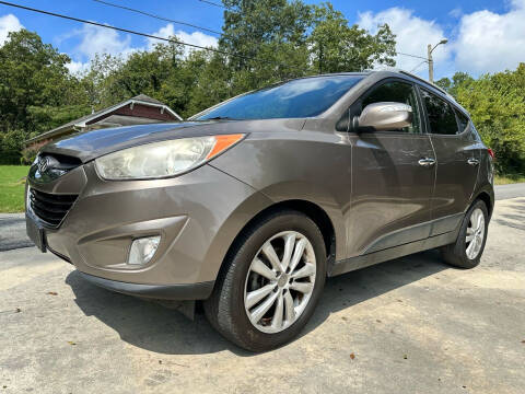 2012 Hyundai Tucson for sale at Cobb Luxury Cars in Marietta GA