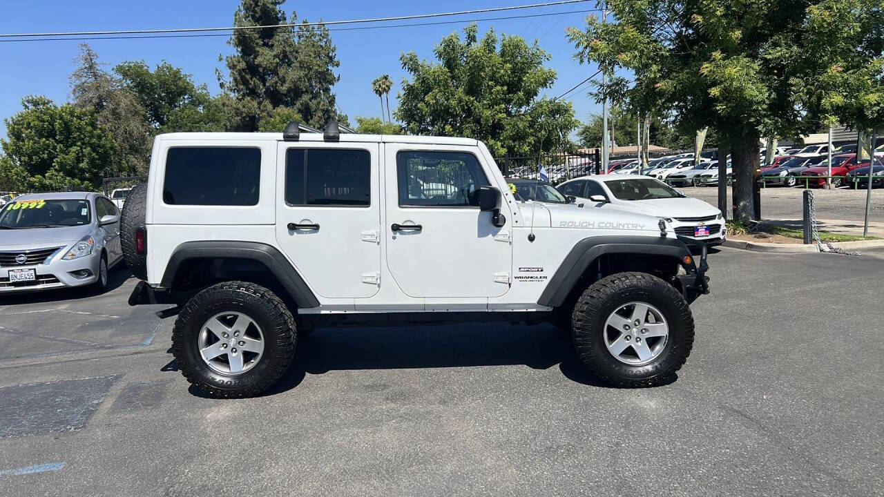 2012 Jeep Wrangler Unlimited for sale at Auto Plaza in Fresno, CA