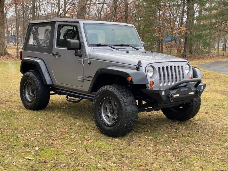 2013 Jeep Wrangler for sale at Choice Motor Car in Plainville CT