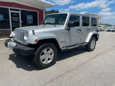 2011 Jeep Wrangler Unlimited for sale at Wallace & Kelley Auto Brokers in Douglasville GA