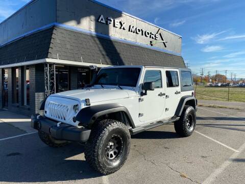 2014 Jeep Wrangler Unlimited for sale at Apex Motors in Murray UT