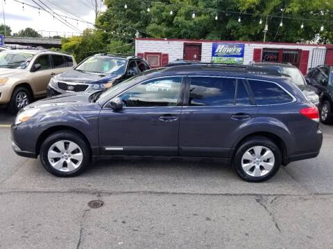 2011 Subaru Outback for sale at Howe's Auto Sales in Lowell MA