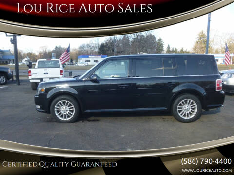2013 Ford Flex for sale at Lou Rice Auto Sales in Clinton Township MI