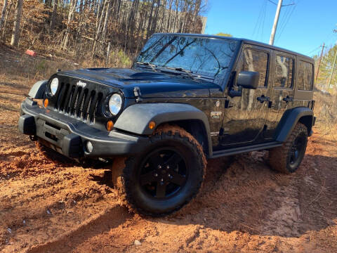 2012 Jeep Wrangler Unlimited for sale at FALCONS AUTOMOTIVE LLC in Buford GA