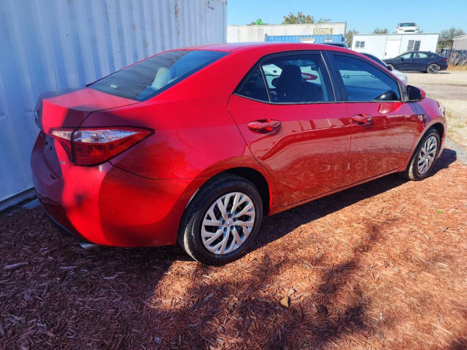 2018 Toyota Corolla for sale at Trek Auto in Orlando, FL