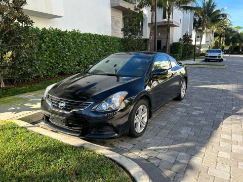 2011 Nissan Altima for sale at CARSTRADA in Hollywood FL