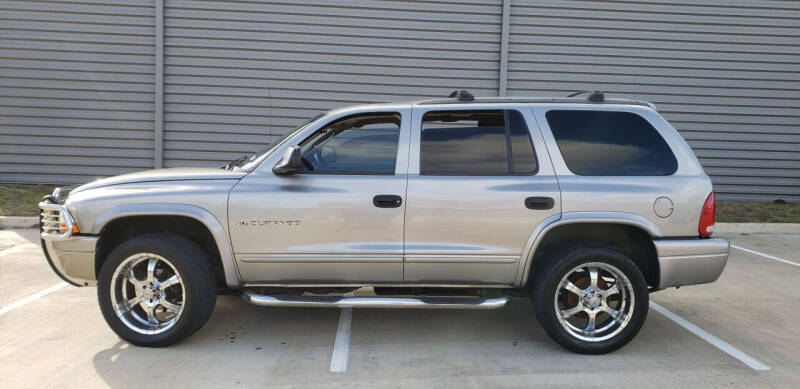 2001 Dodge Durango for sale at AC MOTORCARS LLC in Houston TX