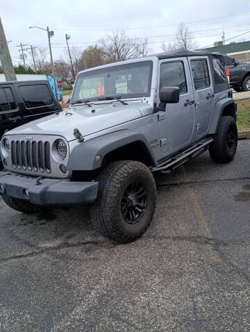 2014 Jeep Wrangler Unlimited for sale at R & R Motor Sports in New Albany IN