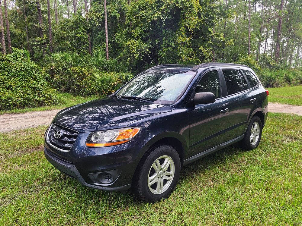 2011 Hyundai SANTA FE for sale at Flagler Auto Center in Bunnell, FL