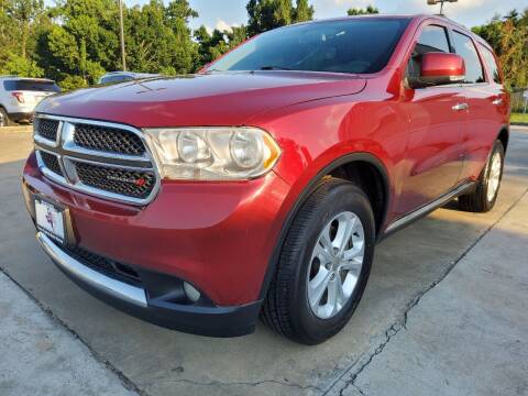 2013 Dodge Durango for sale at Texas Capital Motor Group in Humble TX