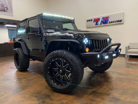 2015 Jeep Wrangler for sale at Driveline LLC in Jacksonville FL