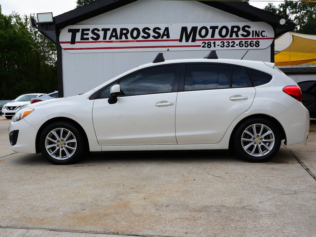 2014 Subaru Impreza for sale at Testarossa Motors in League City, TX