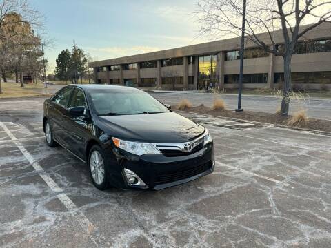 2013 Toyota Camry for sale at QUEST MOTORS in Englewood CO